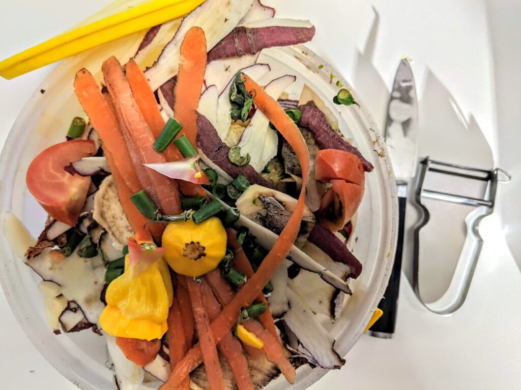 Compost bin filled with organic waste materials